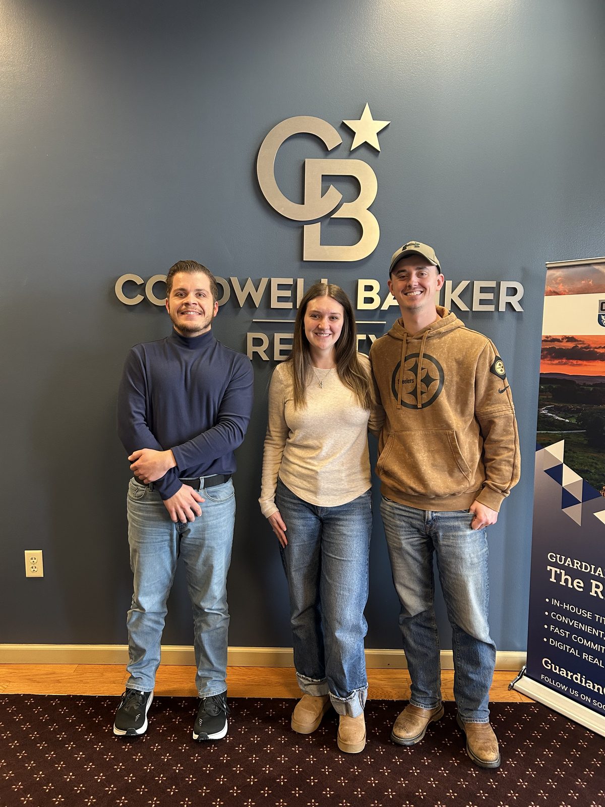 Bryce Barnes with happy clients at Coldwell Banker Realty Chambersburg PA