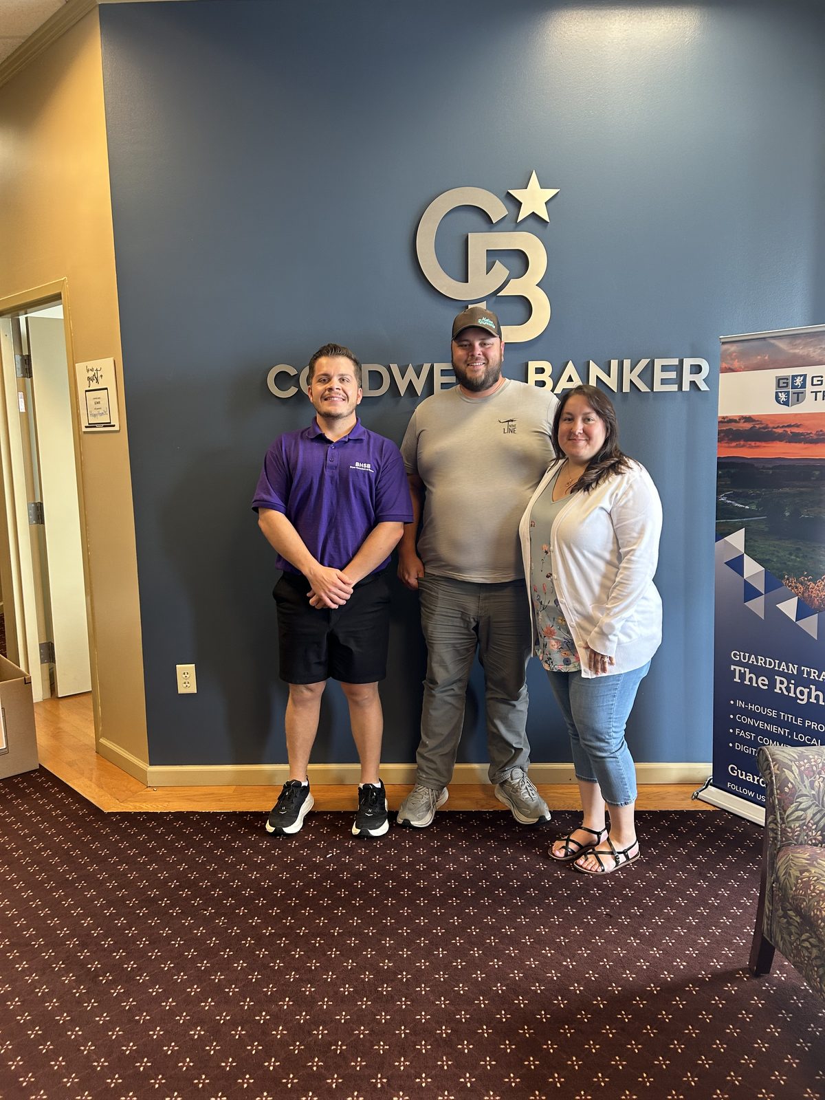 Bryce Barnes with clients at Coldwell Banker Realty Chambersburg PA
