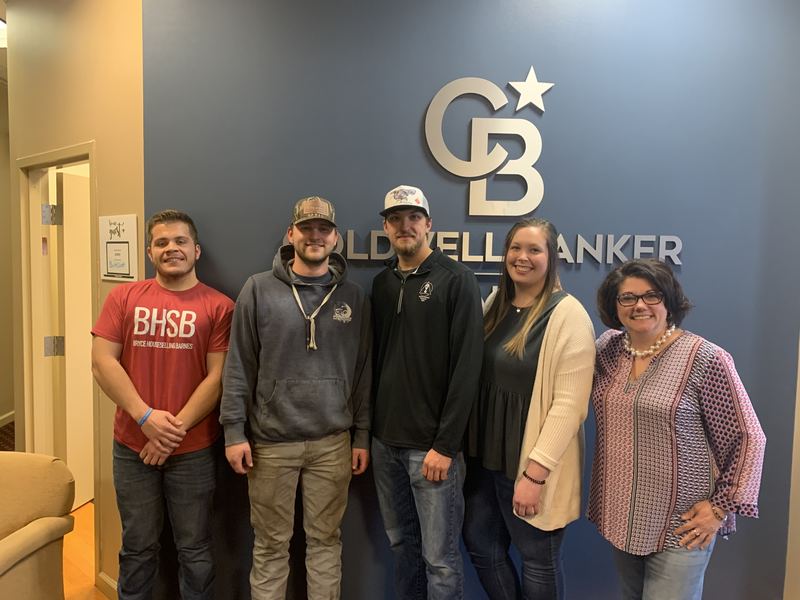 Bryce Barnes BHSB with clients at closing Coldwell Banker Realty Chambersburg PA